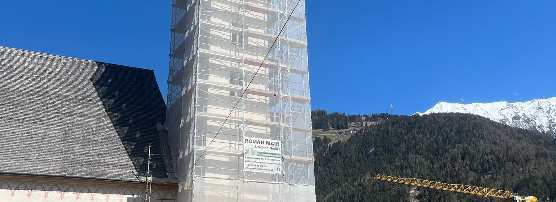 Kirchturm-Einrüstung in Prutz von Gerüstbau Mair